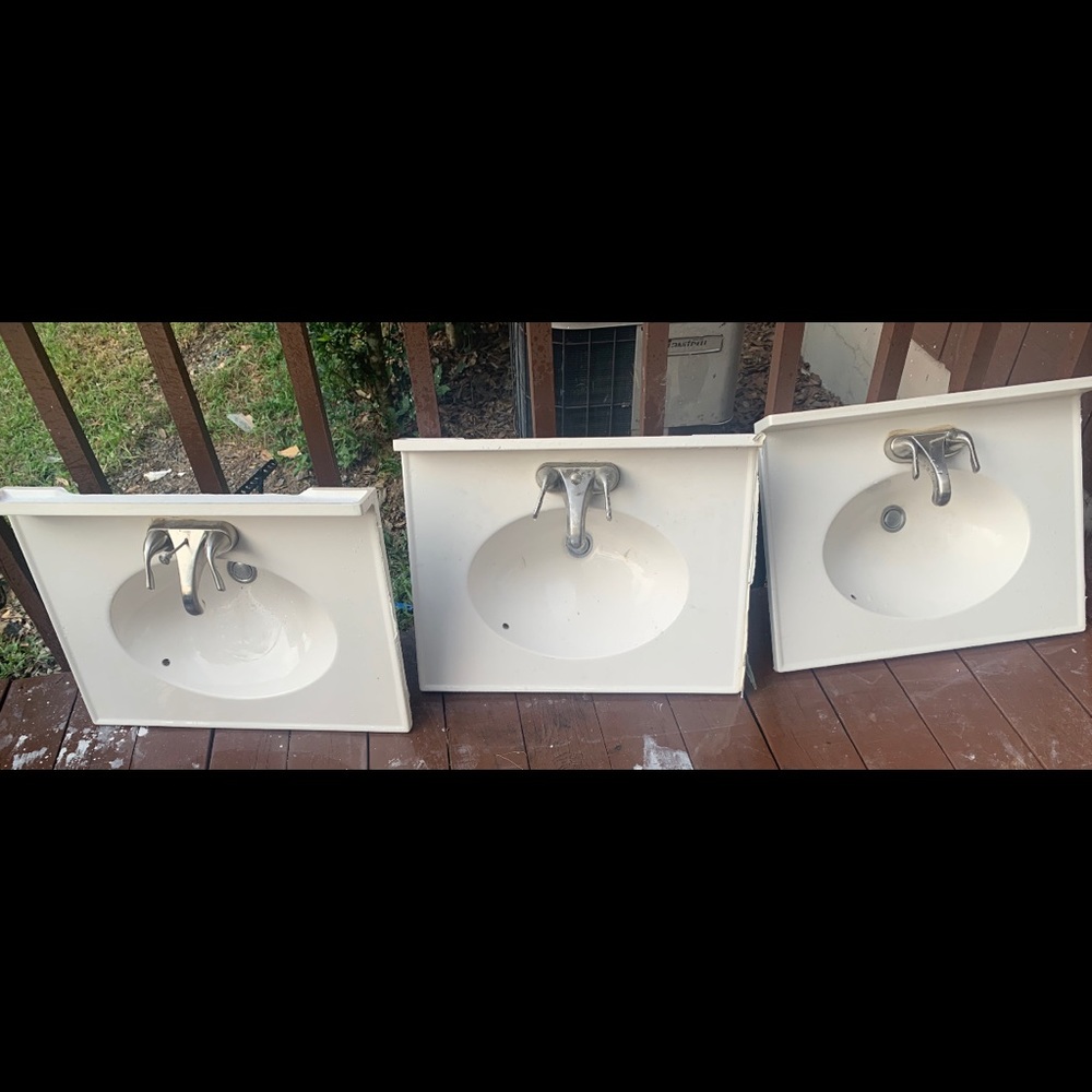 Sink tops with hardware